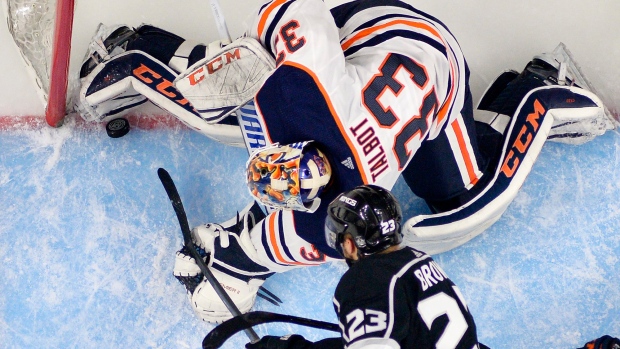 Dustin Brown and Cam Talbot