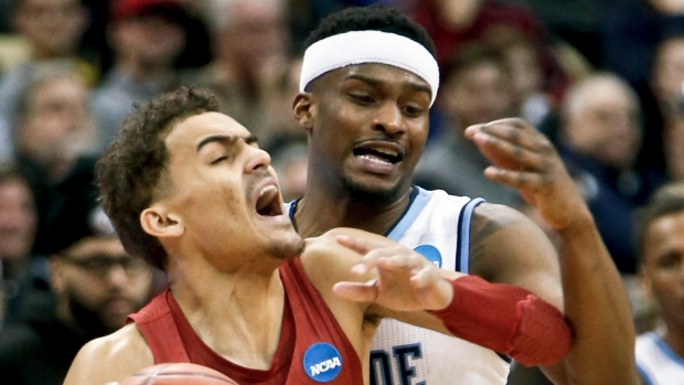Oklahoma's Trae Young and Rhode Island's Stanford Robinson