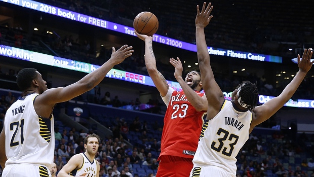 Anthony Davis shoots against Pacers
