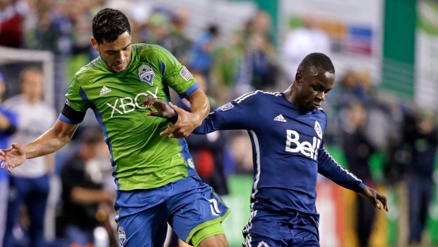 Manneh holds off Neagle