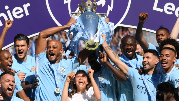 Manchester City celebrates EPL title, Photo by Shaun Botterill/Getty Images Manchester City celebrates EPL title