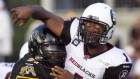 Photo: N/A, License: N/A Ted Laurent hits Henry Burris