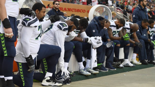 Seahawks kneel during anthem