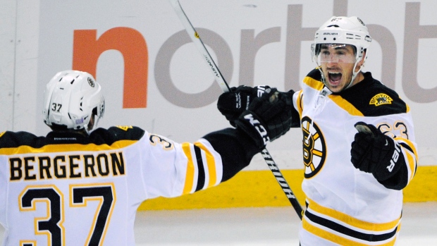 Marchand, Bergeron celebrate