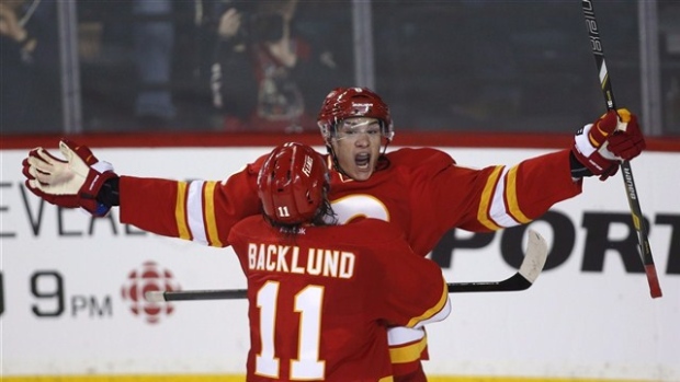 Joe Colborne and Mikael Backlund