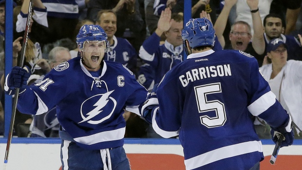 Steven Stamkos and Jason Garrison, The Canadian Press Steven Stamkos and Jason Garrison