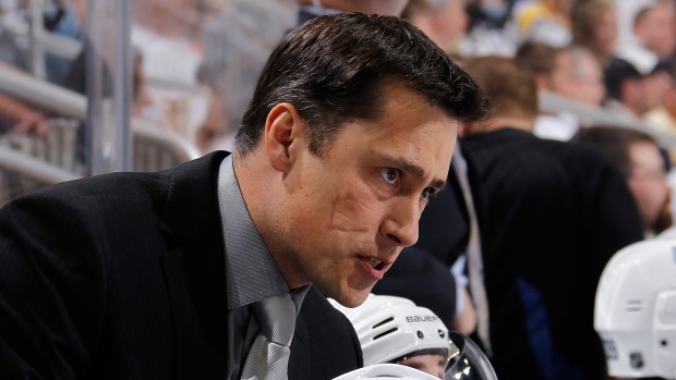 Guy Boucher, Gregory Shamus/National Hockey League/Getty Images Guy Boucher