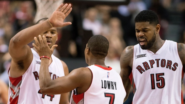 Chuck Hayes, Kyle Lowry and Amir Johnson
