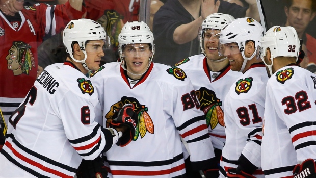 Kane, Blackhawks celebrate, The Canadian Press Kane, Blackhawks celebrate