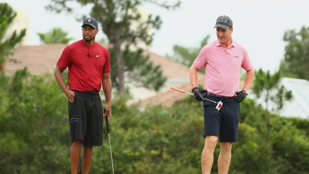 Tiger Woods Peyton Manning, Getty Images Tiger Woods Peyton Manning