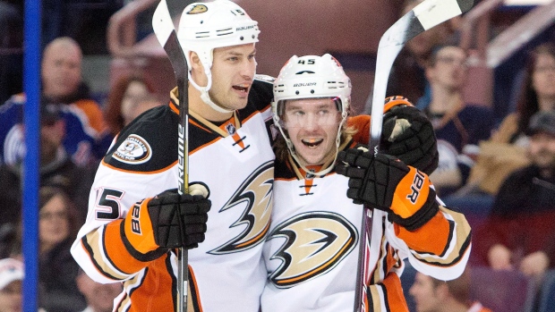 Getzlaf and Vatanen, The Canadian Press Getzlaf and Vatanen
