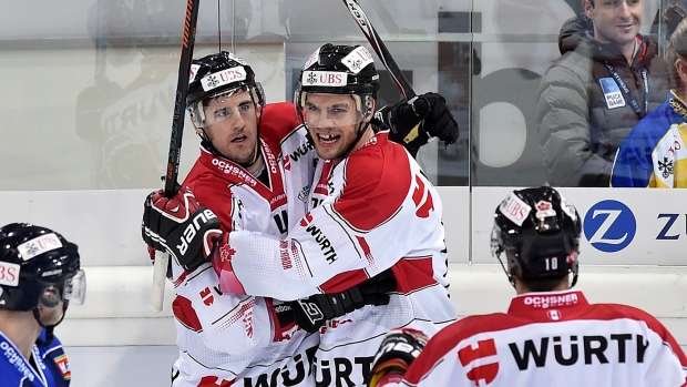 Bud Holloway, Marc Antoine Pouliot celebrate, The Canadian Press Bud Holloway, Marc Antoine Pouliot celebrate