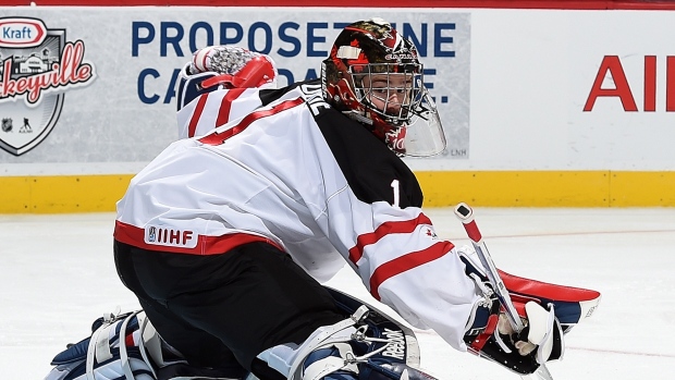 Eric Comrie, HHOF-IIHF/Images on Ice Eric Comrie