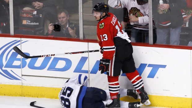 Daniel Carcillo reacts after hit on Perreault 