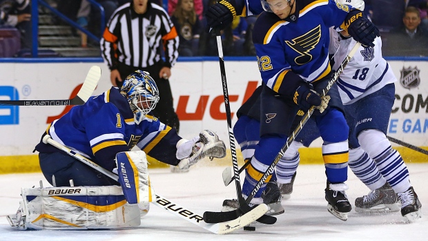 Elliott covers puck vs. Leafs, The Canadian Press Elliott covers puck vs. Leafs