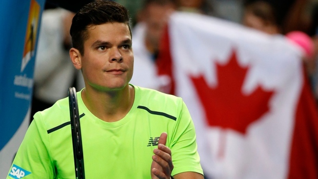 Milos Raonic with Canadian flag