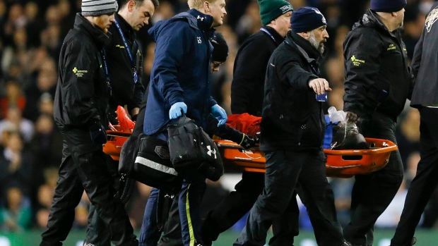 Swansea's Bafetimbi Gomis collapses during Premier League match, leaves field on stretcher Article Image 0
