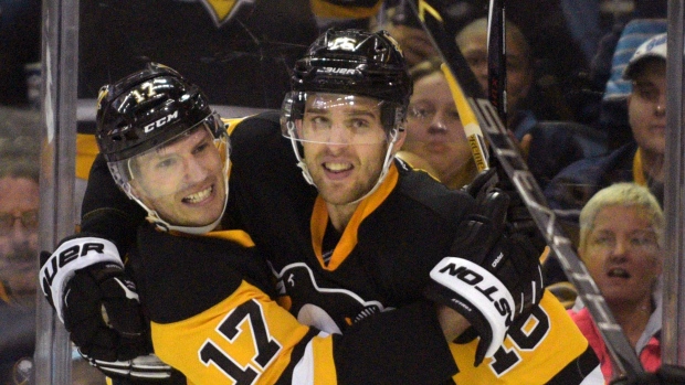 Comeau, Sutter celebrate, The Canadian Press Comeau, Sutter celebrate
