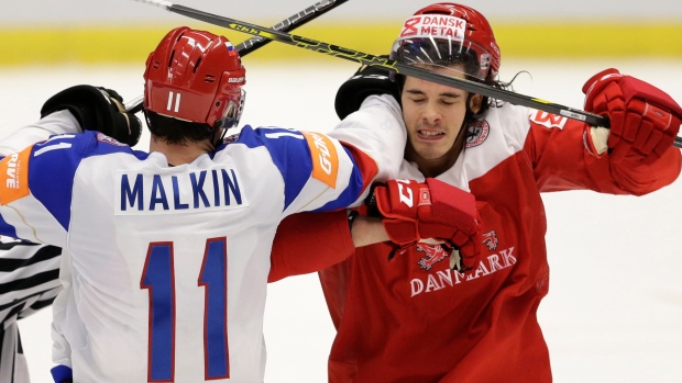 Malkin and Lauridsen, The Canadian Press Malkin and Lauridsen