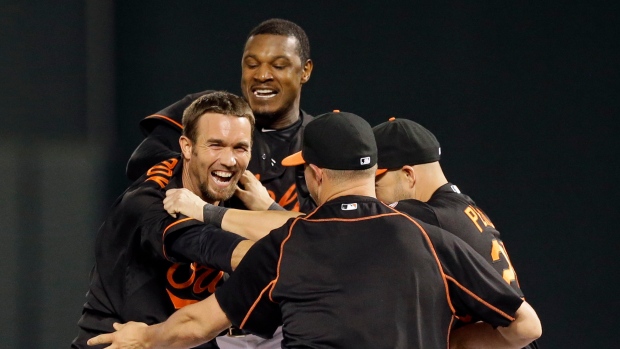 Orioles mob JJ Hardy, The Canadian Press Orioles mob JJ Hardy