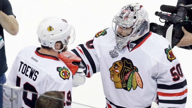 Crawford, Toews celebrate, The Canadian Press Crawford, Toews celebrate