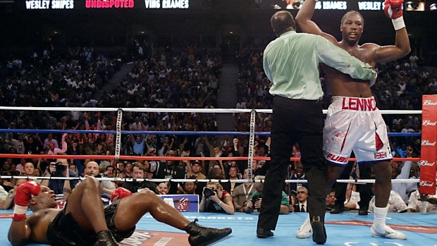 Lennox Lewis knocks down Mike Tyson