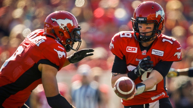 Jon Cornish Bo Levi Mitchell, The Canadian Press Jon Cornish Bo Levi Mitchell