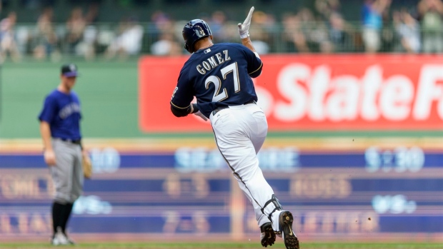 Gomez hits 3-run shot, Garza goes 7 innings and Brewers stay perfect vs Rockies with 7-4 win Article Image 0