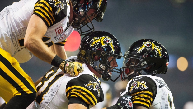 Coates, Tiger-Cats celebrate, The Canadian Press Coates, Tiger-Cats celebrate