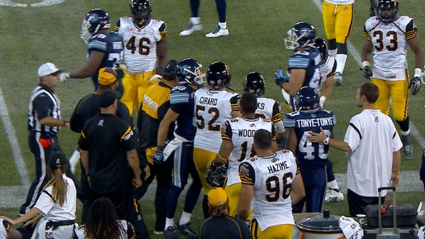 Kent Austin bumps Dave Stala, TSN Kent Austin bumps Dave Stala