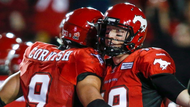 John Cornish and Bo Levi Mitchell , The Canadian Press John Cornish and Bo Levi Mitchell