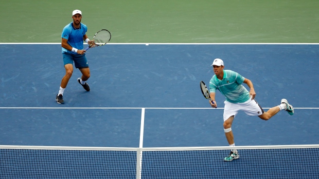 Steve Johnson and Sam Querrey, Al Bello/Getty Images Steve Johnson and Sam Querrey