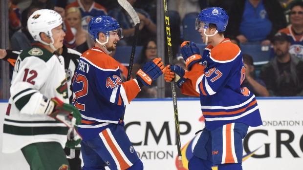 Slepyshev, McDavid celebrate, The Canadian Press Slepyshev, McDavid celebrate