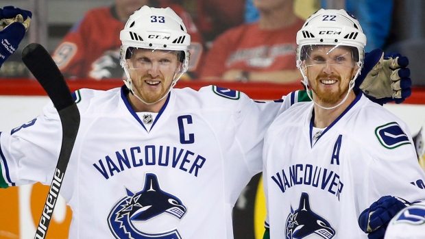 Canucks Henrik Sedin Daniel Sedin, CP Canucks Henrik Sedin Daniel Sedin