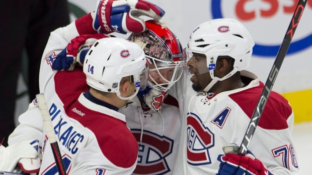 Canadiens celebrate with Condon, The Canadian Press Canadiens celebrate with Condon