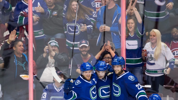 Sedin, Vrbata and Edler, The Canadian Press Sedin, Vrbata and Edler