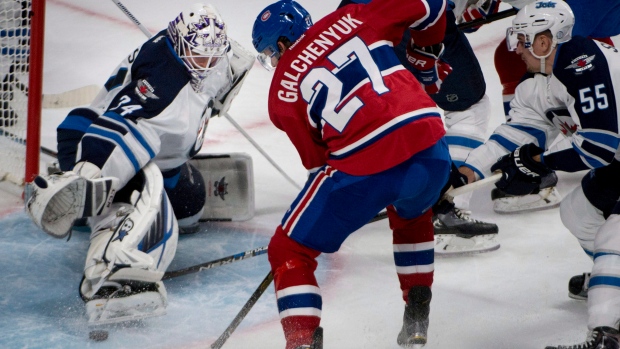 Jets Michael Hutchinson Canadiens Alex Galchenyuk, CP Jets Michael Hutchinson Canadiens Alex Galchenyuk