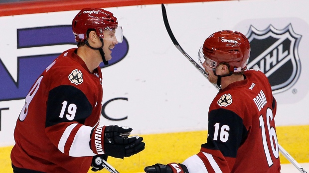 Doan, Domi celebrate, The Canadian Press Doan, Domi celebrate