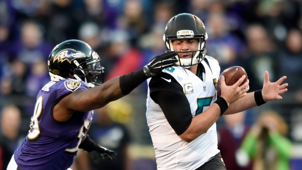 Dumervil grabs Bortles' facemask, The Canadian Press Dumervil grabs Bortles' facemask