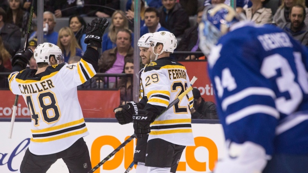 Bruins celebrate behind Reimer