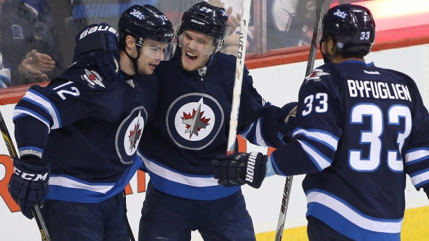 Drew Stafford Nikolaj Ehlers Dustin Byfuglien, The Canadian Press Drew Stafford Nikolaj Ehlers Dustin Byfuglien