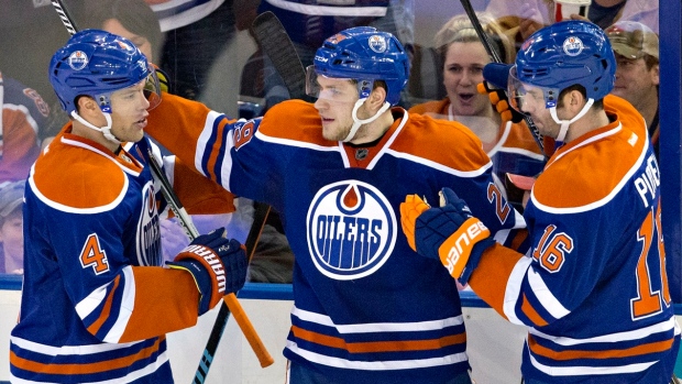 Hall, Draisaitl, Purcell celebrate, The Canadian Press Hall, Draisaitl, Purcell celebrate
