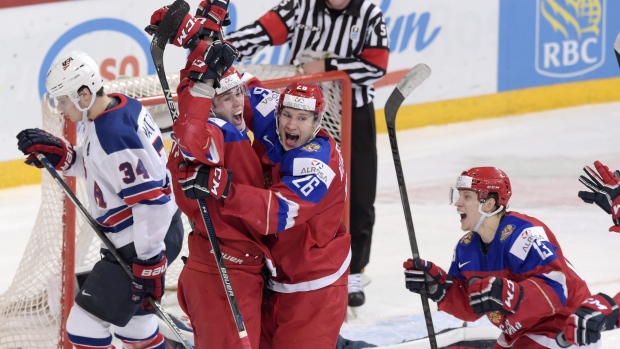 Russia celebrates, The Canadian Press Russia celebrates