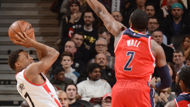 Kyle Lowry and John Wall , Ron Turenne/National Basketball Association/Getty Images Kyle Lowry and John Wall