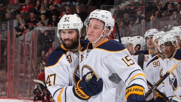 Jack Eichel and Zach Bogosian , Andre Ringuette/National Hockey League/Getty Images Jack Eichel and Zach Bogosian