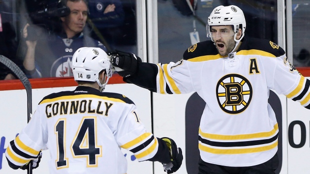 Connolly, Bergeron celebrate, The Canadian Press Connolly, Bergeron celebrate