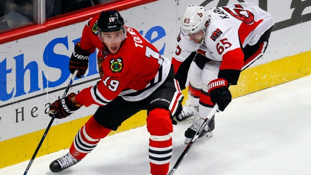 Jonathan Toews & Erik Karlsson, The Canadian Press Jonathan Toews & Erik Karlsson