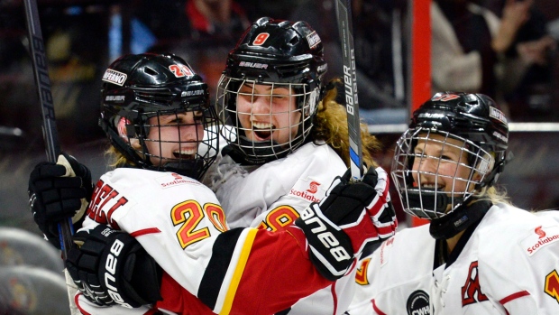 Campbell, Davis celebrate, The Canadian Press Campbell, Davis celebrate