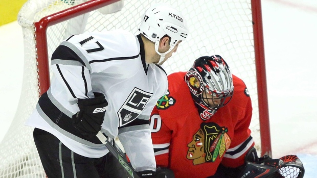 Milan Lucic and Corey Crawford, The Canadian Press Milan Lucic and Corey Crawford