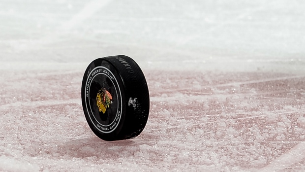 NHL Blackhawks puck, Bill Smith/NHLI via Getty Images NHL Blackhawks puck